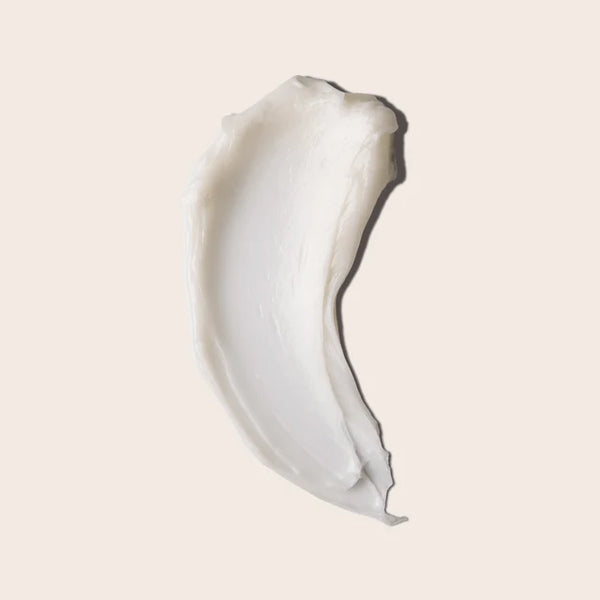 Everist The Deep Conditioning Concentrate White cream product swatch on a light beige background