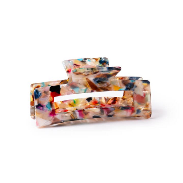 Multicolored hair clip on a white background