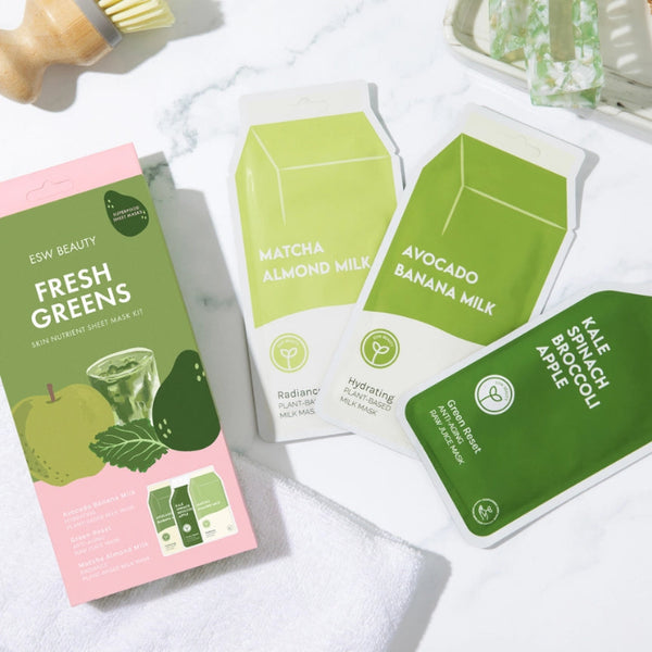 Fresh Greens Superfood Sheet Mask Set with green and pink packaging on a white surface