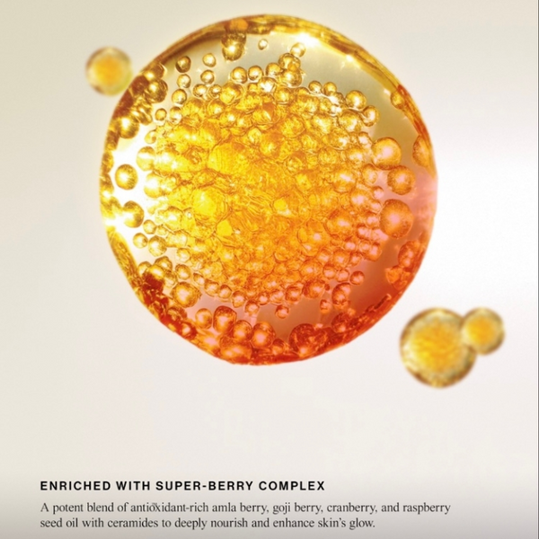 Close-up of a droplet enriched with super-berry complex on a light background