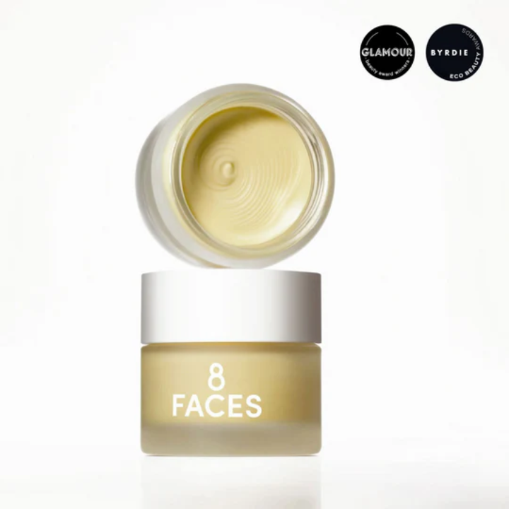 Skincare product jar labeled '8 Faces' with cream visible, on a white background.