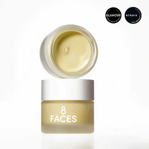 Skincare product jar labeled '8 Faces' with cream visible, on a white background.
