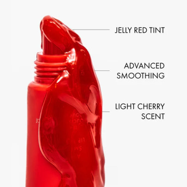 Red lip balm with features labeled on a white background
