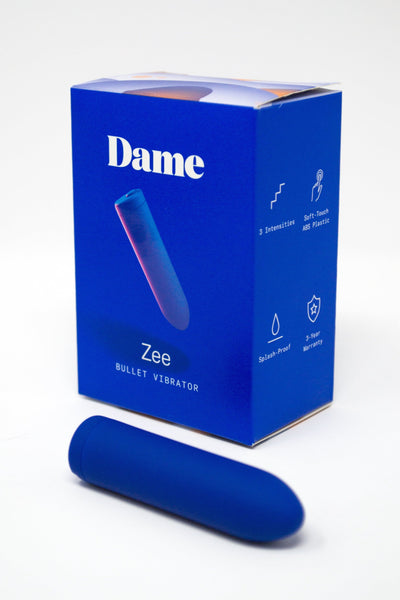 Blue 'Dame Zee' bullet vibrator packaging on a white background