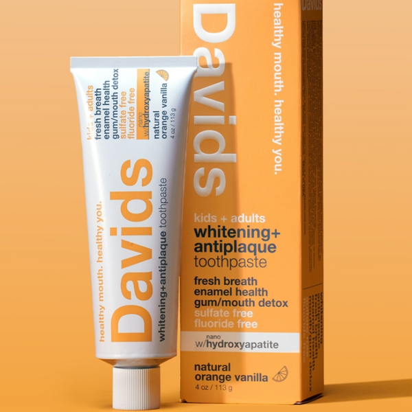 tube and box of Davids Hydroxyapatite kids orange vanilla toothpaste