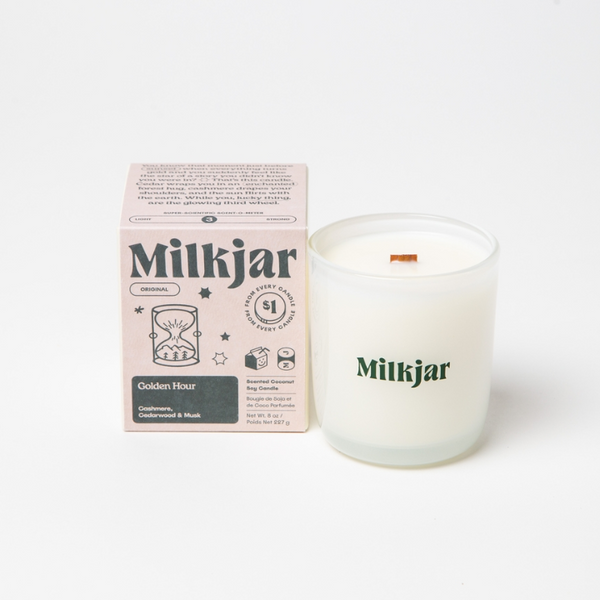 Milkjar candle and packaging on a white background