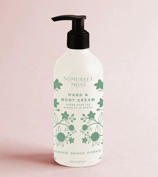 Somerset Moss hand and body cream bottle on a light pink background