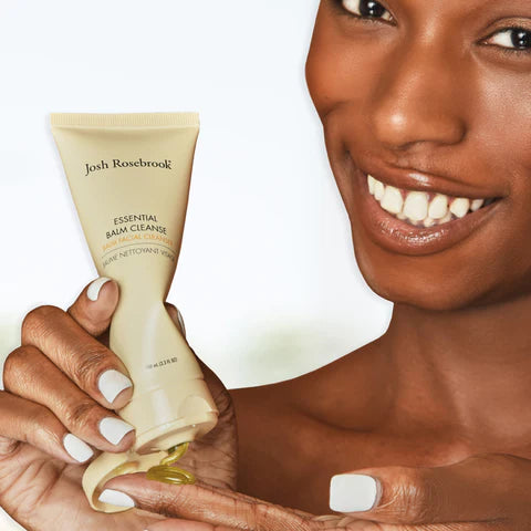 Person holding Josh Rosebrook Essential Balm Cleanse Tube