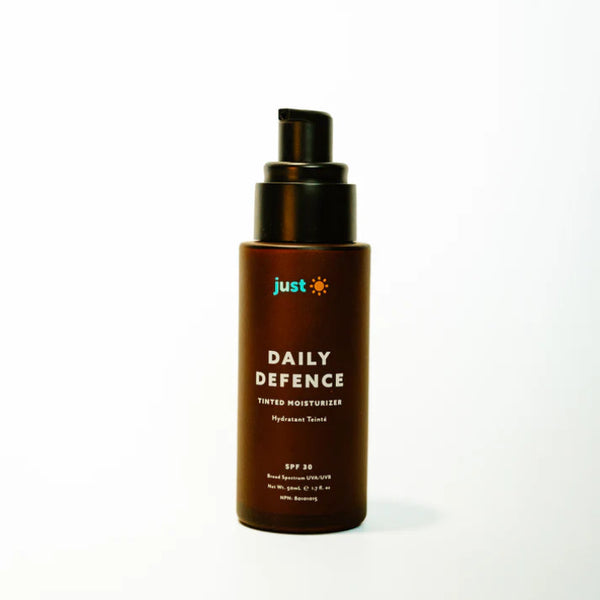 Bottle of 'Daily Defence' moisturizer with SPF 30 on a white background