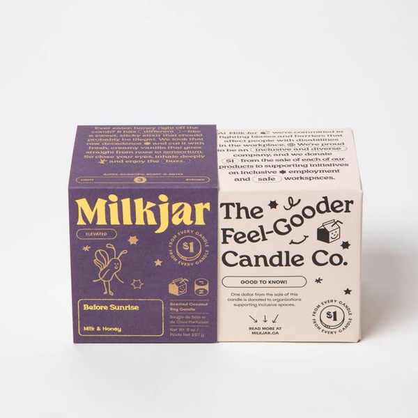 Box of Milkjar candle with branding and product details on a white background