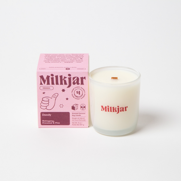 Milkjar candle and packaging on a white background