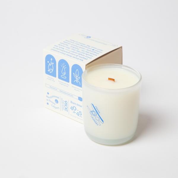 Candle with packaging on a white background