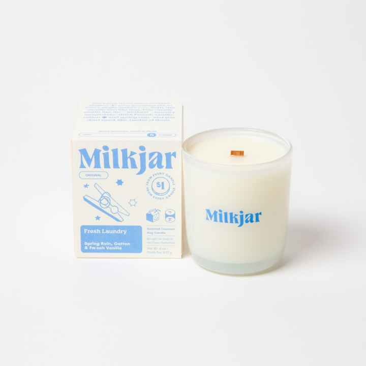 Milkjar candle and packaging on a white background
