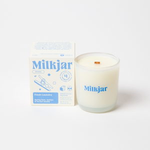 Milkjar candle and packaging on a white background