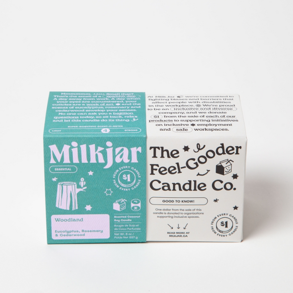Milkjar candle packaging with branding and product details on a white background