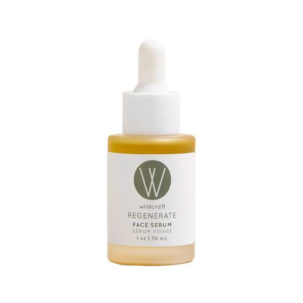 Bottle of Wildcraft Regenerate Face Serum on a beige background