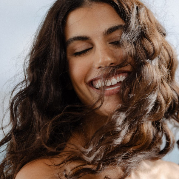 Person after they washed their hair with Rocky Wild Kindness Shampoo