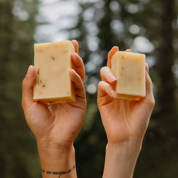 people holding bars of Rocky cold pressed lemongrass bar soap