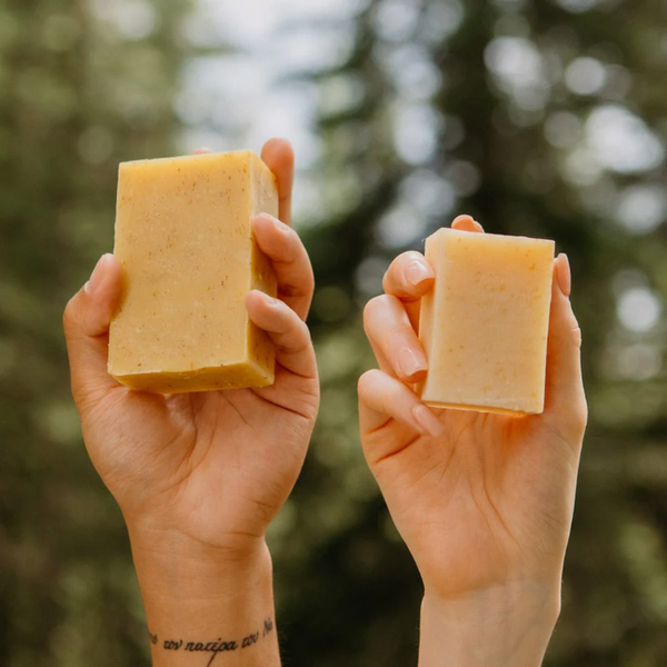 people holding bars of Rocky Pumpkin cold pressed soap