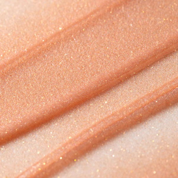 Close-up of Rose Sugar Smoothie Lip Treatment swatch with glitter