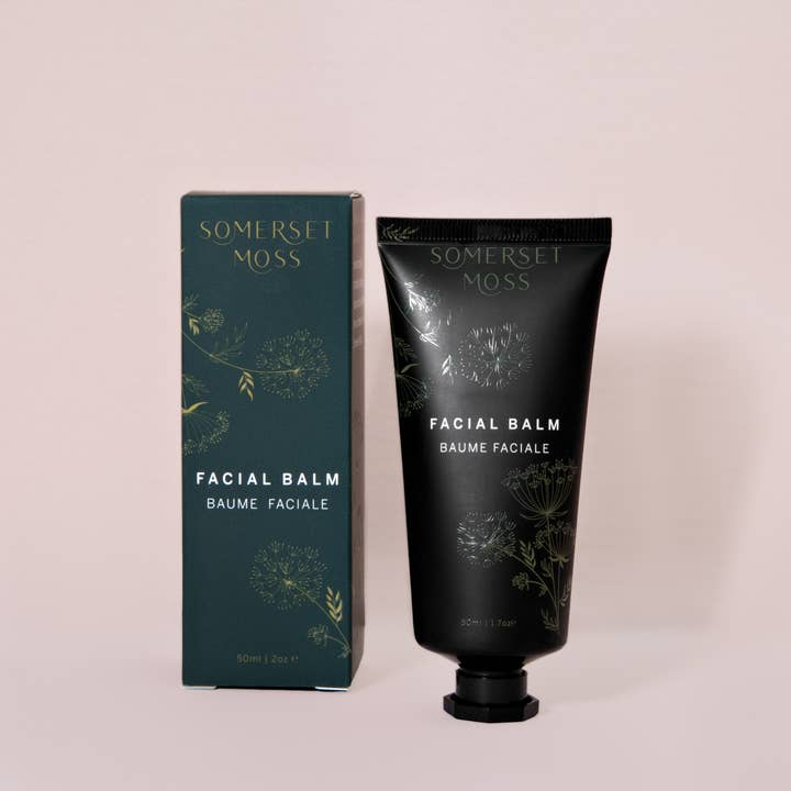 Somerset Moss facial balm and packaging on a light pink background