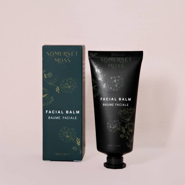 Somerset Moss facial balm and packaging on a light pink background