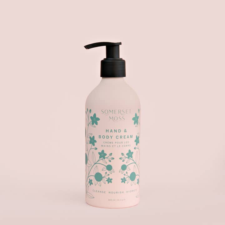 Somerset Moss hand and body cream bottle on a light pink background