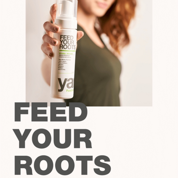 Person holding Yarok Feed Your Roots Mousse