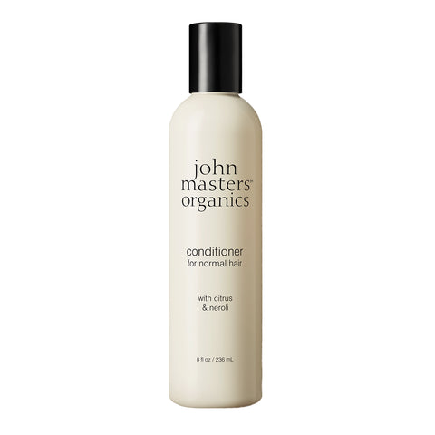 John Masters Organics conditioner bottle on a white background