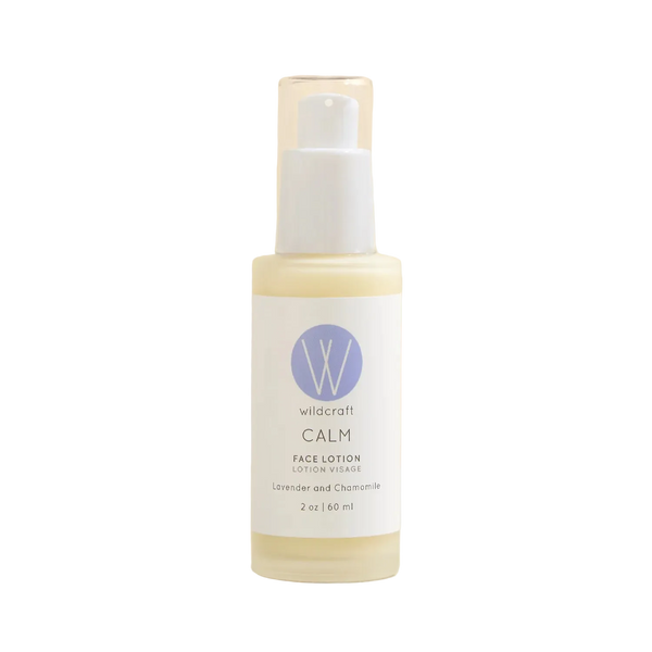 Bottle of Wildcraft Calm face lotion on a beige background