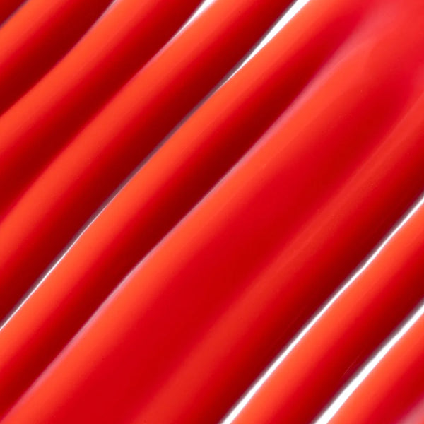 Close-up of red pipes with a blurred background