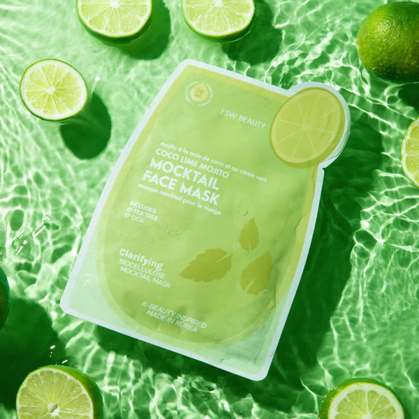 Coco Lime Mojito Mocktail Face Mask with lime slices on a green water background