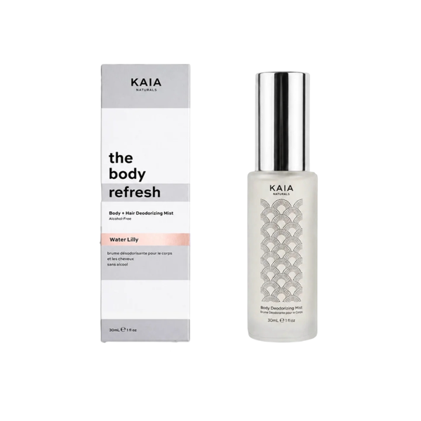 KAIA Naturals 'The Body Refresh' Body + Hair Dandruffing Mist in Water Lily scent, shown with its white and gray packaging box and the clear bottle with a silver cap on a white background.