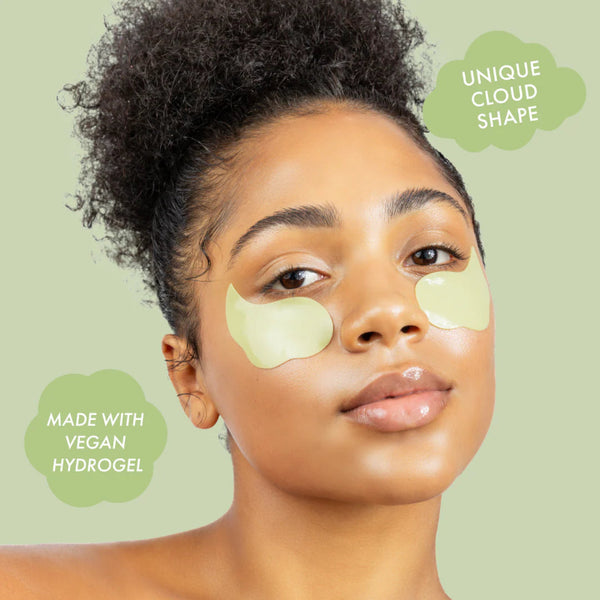 Woman wearing Strawberry Matcha Latte Eye Patches that are cloud-shaped with text on a green background, featured in the Strawberry Sweets Skincare Treats Set